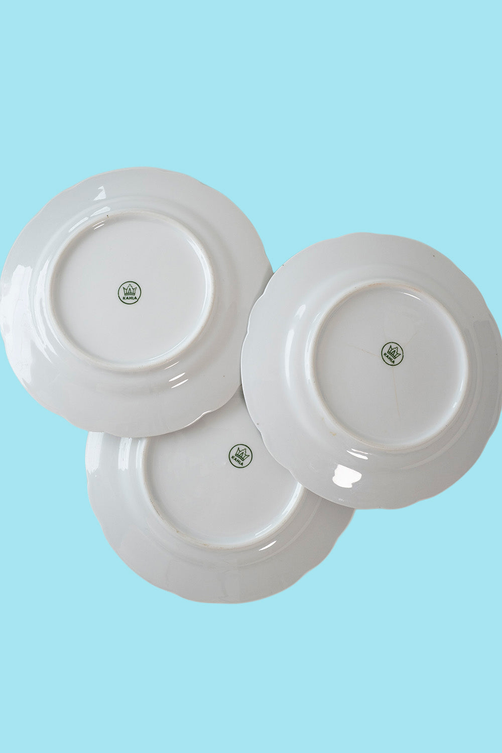 3 decorated dessert plates