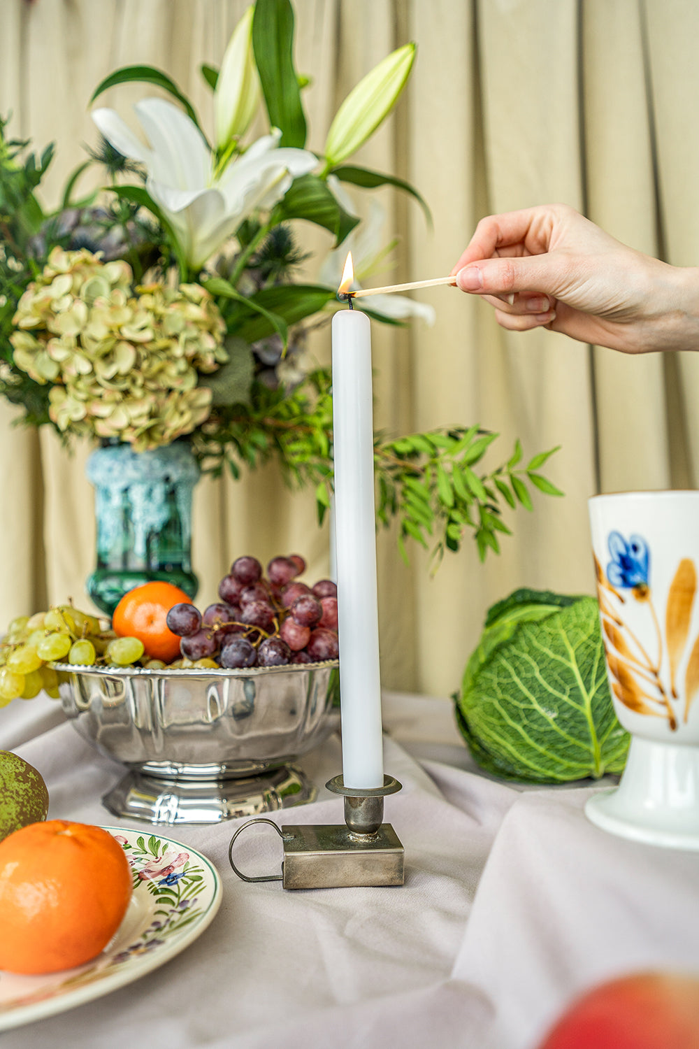 Small silver-plated candlestick and matchbox holder
