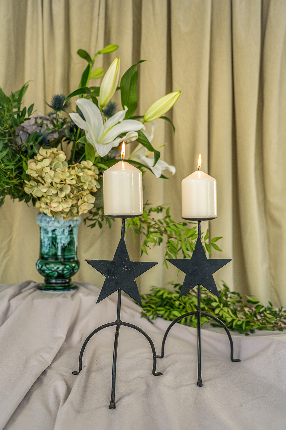 Pair of metal candle holders
