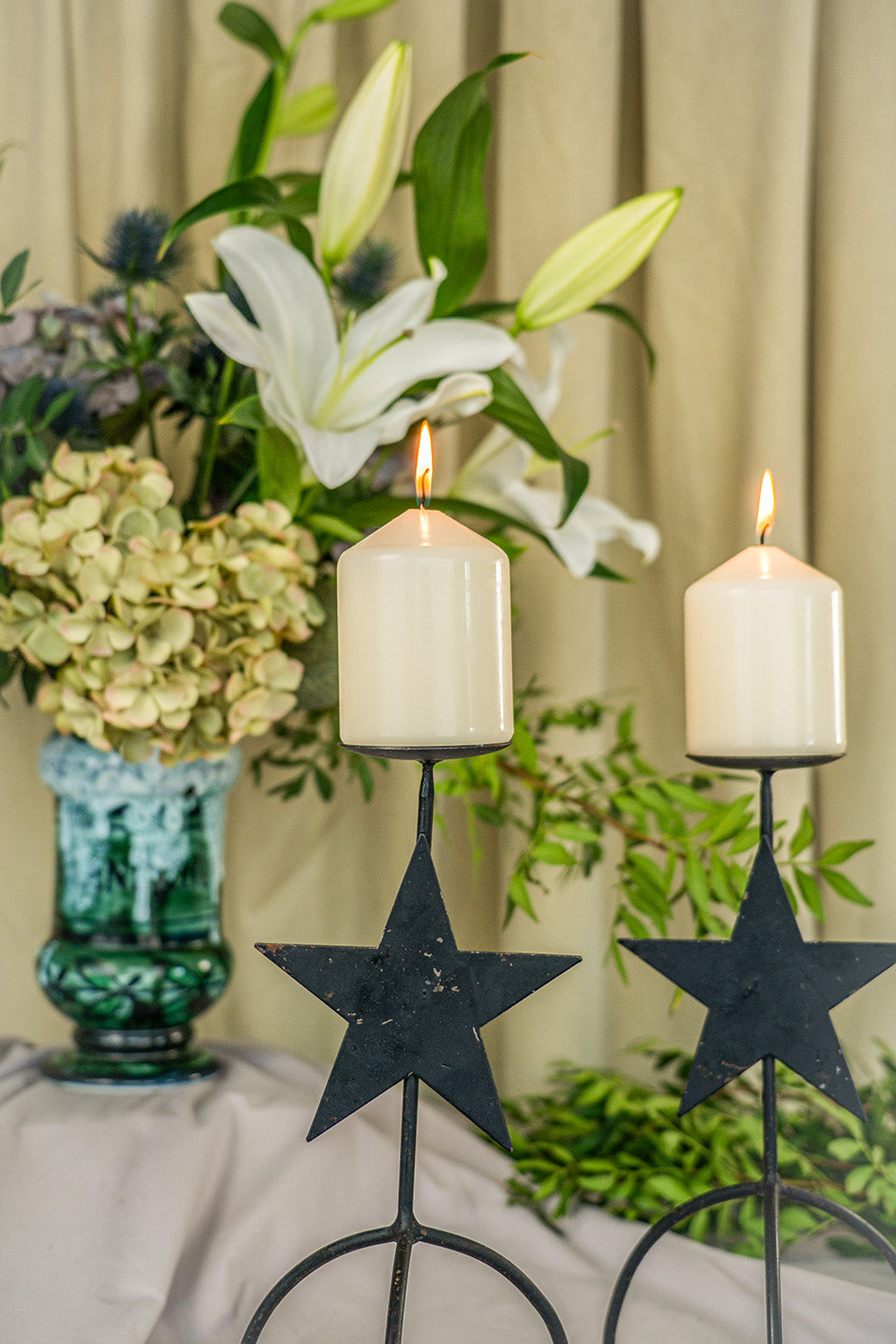 Pair of metal candle holders