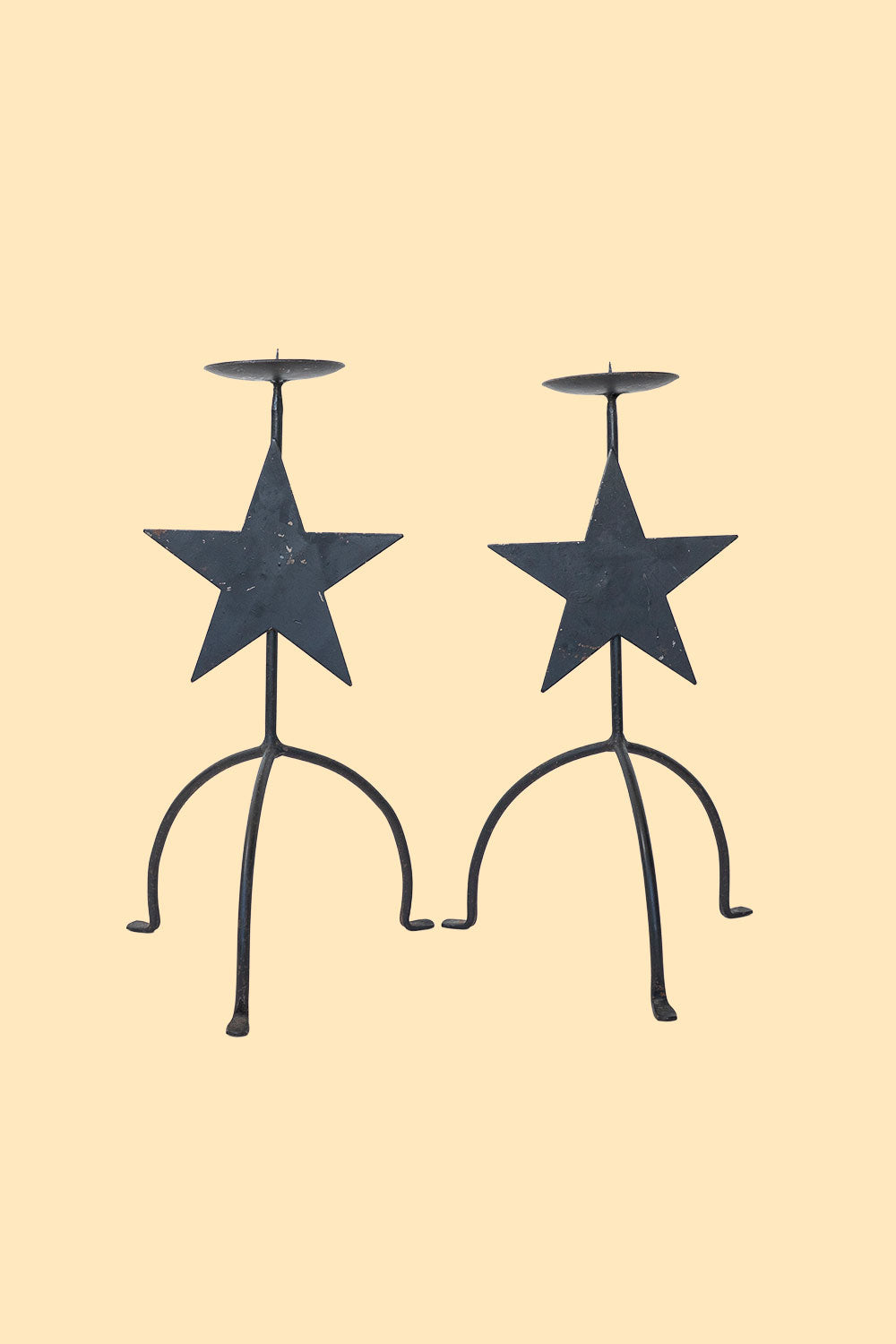 Pair of metal candle holders