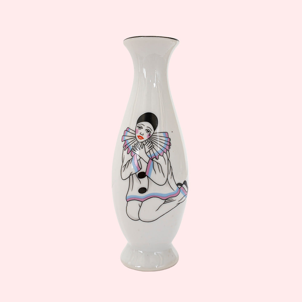 White vase with Pierrot design and a black rim.